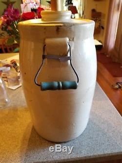 Antique 4 Gallon Pottery Stoneware Crock. Wood handles and Wood butter Churn