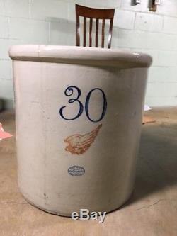 Antique Red wing stoneware 30 gallon crock large wing and has handles 1915