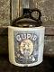 Neat Old Brown & White Jug 1 Gallon Size W Cupid Whiskey Label Stoneware Crock