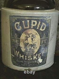 Neat Old Brown & White Jug 1 Gallon Size w Cupid Whiskey Label Stoneware Crock