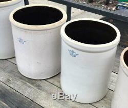 Seven Blue Crown Stoneware Crocks Sizes 12, 10, 8, 6, 5, 3, and 2 gallons